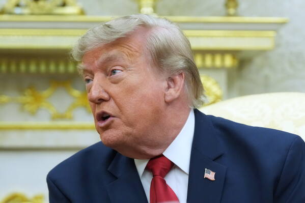 President Donald Trump speaks as he meets with Iraq's Prime Minister Ali al-Zaidi in the Oval Office of the White House, Tuesday, July 14, 2026, in Washington. (AP Photo/Julia Demaree Nikhinson)