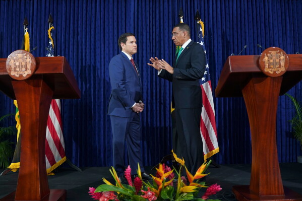 U.S. Secretary of State Marco Rubio, left, and Jamaica's Prime Minister Andrew Holness speak after giving a joint news conference at the office of the prime minister in Kingston, Jamaica, March 26, 2025. (Nathan Howard/Pool Photo via AP, File)