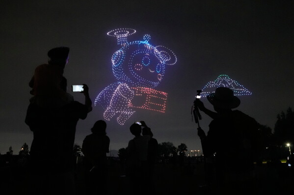 Drones light up the night sky during the K-Drone Festival at a park in Incheon, South Korea, Wednesday, July 15, 2026. (AP Photo/Ahn Young-joon)