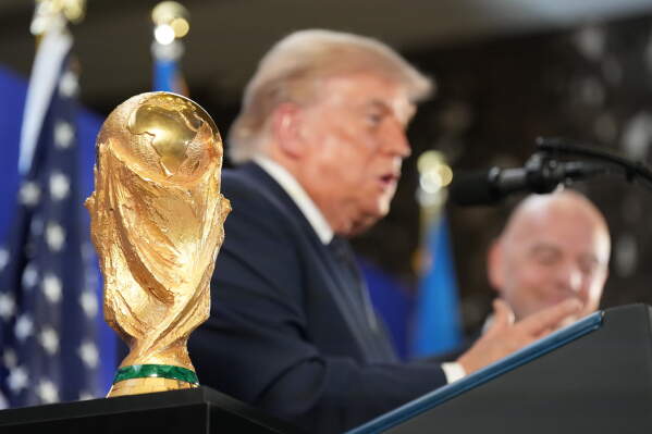 President Donald Trump speaks as FIFA President Gianni Infantino listens at a reception at Trump Tower in New York, Friday, July 17, 2026. (AP Photo/Jacquelyn Martin)