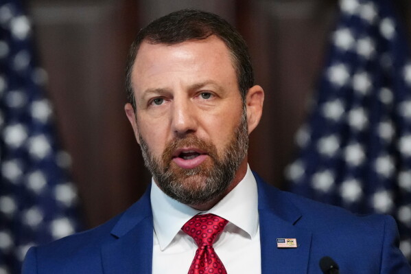 Homeland Security Secretary Markwayne Mullin speaks in the Indian Treaty Room at the Eisenhower Executive Office Building on the White House campus, Friday, July 17, 2026, in Washington. (AP Photo/Julia Demaree Nikhinson)