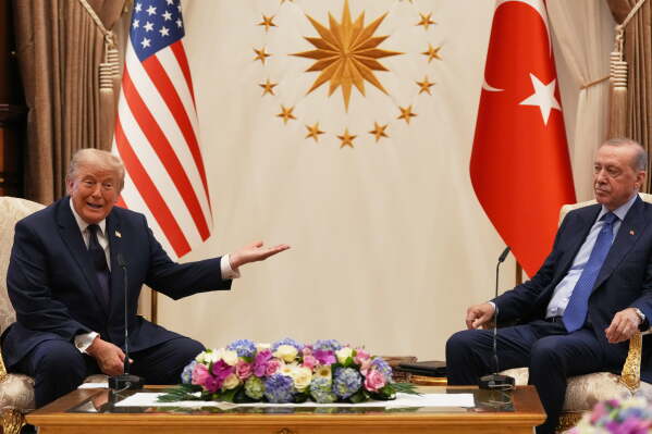 President Donald Trump gestures next to Turkish President Recep Tayyip Erdogan at the beginning of a bilateral meeting at the NATO summit in Ankara, Turkey, Tuesday, July 7, 2026. (AP Photo/Alex Brandon)
