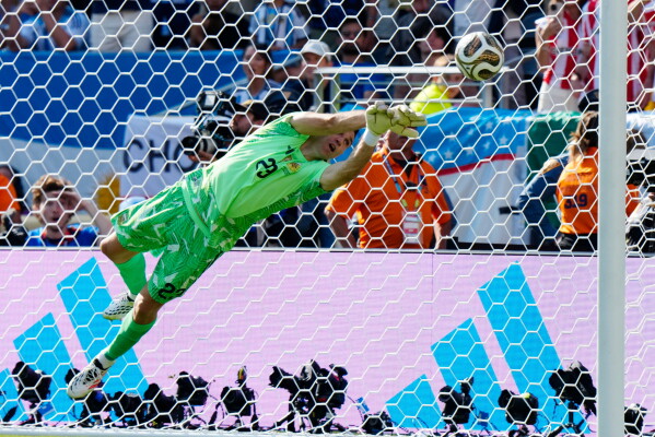 Argentina goalkeeper Emiliano Martínez makes a save against Spain during the second half of the World Cup final soccer match between Spain and Argentina in East Rutherford, N.J., near New York, Sunday, July 19, 2026. (Frank Gunn/The Canadian Press via AP)