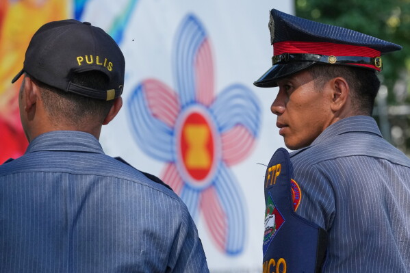 Police guard outside the venue of the 59th ASEAN Foreign Ministers' Meeting, Post-Ministerial Conferences, and the 50th Anniversary of the Treaty of Amity and Cooperation in Southeast Asia on Monday, July 20, 2026, in Manila, Philippines. (AP Photo/Aaron Favila)