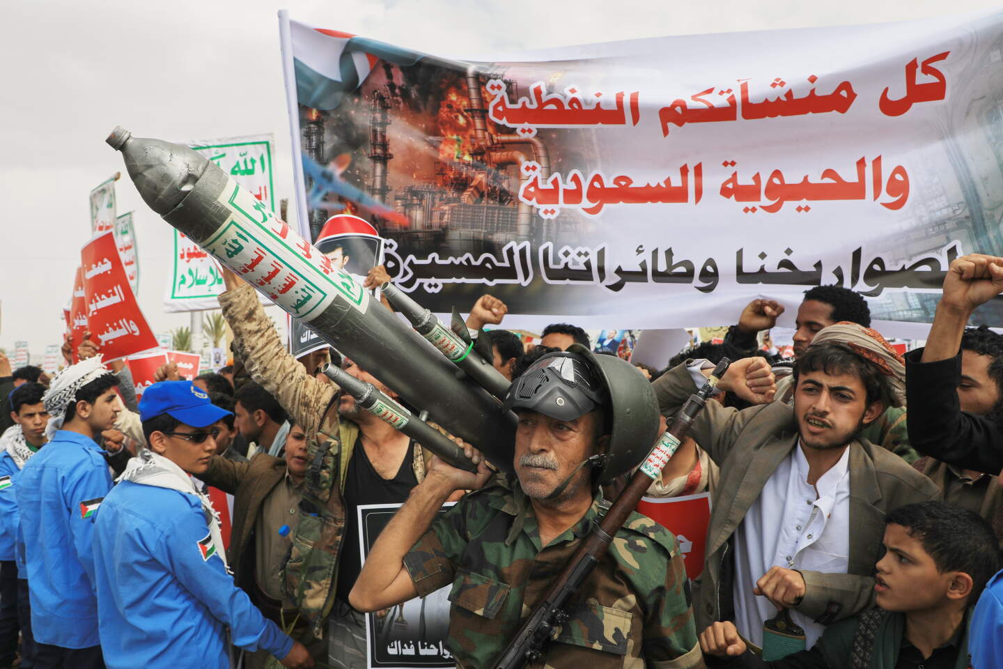 Houthi supporters hold a rally in Sanaa, Yemen, Friday, July 17, 2026, against the Saudi-led coalition. Banner in Arabic reads, "All Saudi oil facilities are targets to our missiles and drones." (AP Photo/Osamah Abdulrahman)