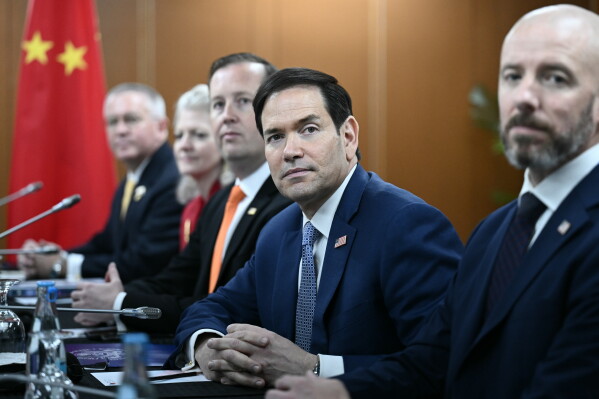 Secretary of State Marco Rubio, center, looks on during a bilateral meeting with China's Foreign Minister Wang Yi on the sidelines of the Association of Southeast Asian Nations (ASEAN) Foreign Ministers' Meeting in Pasay, Metro Manila, Philippines Wednesday, July 22, 2026. (Brendan Smialowski/Pool Photo via AP)