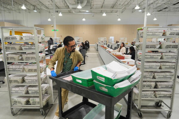 Ballots are sorted the day after California's primary election at the LA County Ballot Processing Center, June 3, 2026, in City of Industry, Calif. (AP Photo/Jae C. Hong, File)