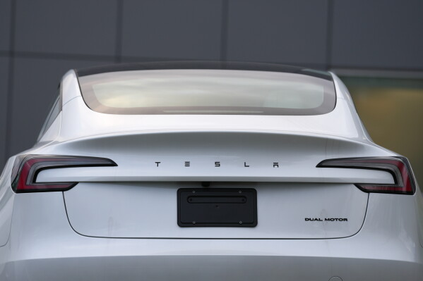 A Tesla vehicle is seen at a Tesla facility Wednesday, April 15, 2026, in Portland, Ore. (AP Photo/Jenny Kane, File)