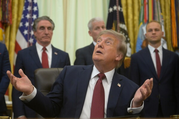 President Donald Trump speaks in the Oval Office of the White House, Friday, July 24, 2026, in Washington. (AP Photo/Rod Lamkey, Jr.)