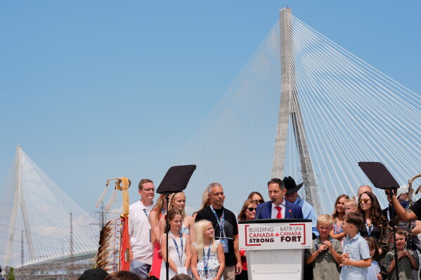 Dr. Murray Howe, speaks representing the Howe family, during a Canadian celebration for the opening of the Gordie Howe International bridge connecting Detroit and Windsor, Ontario Friday, July 24, 2026, in Windsor. (AP Photo/Paul Sancya)