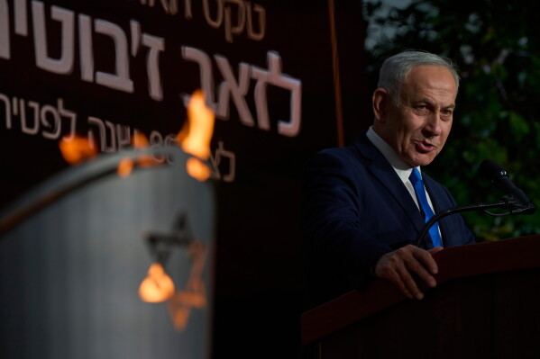 Israeli Prime Minister Benjamin Netanyahu speaks at the state memorial for Ze'ev Jabotinsky, at Mount Herzl Military Cemetery in Jerusalem, Tuesday, July 14, 2026. (AP Photo/Ohad Zwigenberg)
