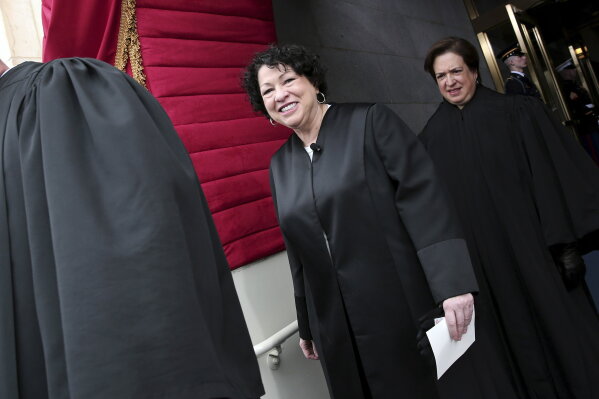 FILE - In this Monday, Jan. 21, 2013 file photo, Supreme Court Justice Sonia Sotomayor and Elena Kagan arrive for President Barack Obama's ceremonial swearing-in ceremony during the 57th presidential inauguration at the Capitol in Washington. Obama nominated Kagan and Sotomayor, the first Latina on the U.S. Supreme Court. And more than 100 minority judges were added to the federal bench, according to the Pew Research Center. (AP Photo/Win McNamee, Pool)