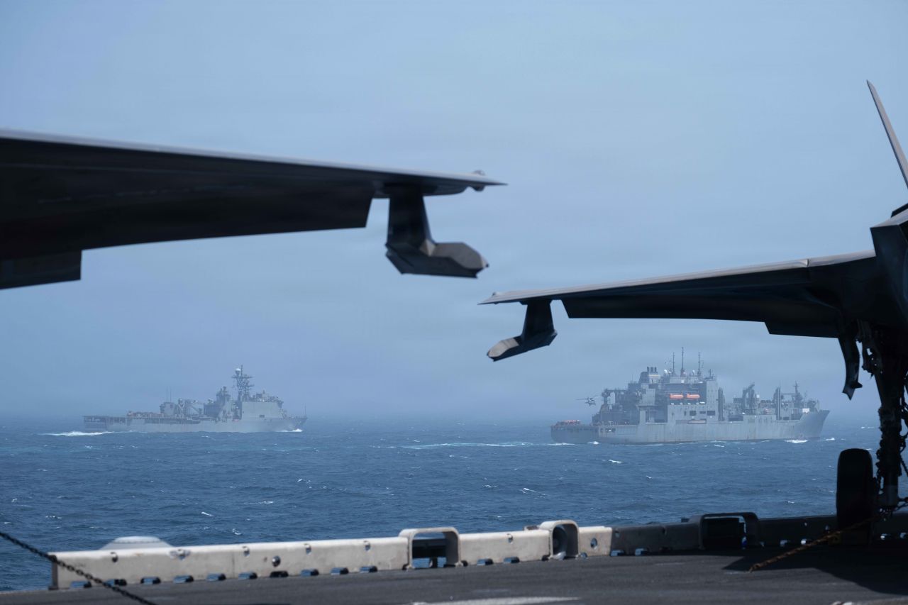 Wasp-class amphibious assault ship USS Boxer sails alongside Whidbey Island-class dock landing ship USS Comstock and Lewis and Clark-class dry cargo ship USNS Cesar Chavez, during a vertical replenishment, July 7.