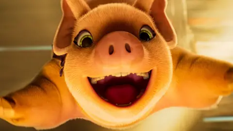 Angel Studios A still image from Animal Farm showing a pig smiling at the camera with outstretched legs