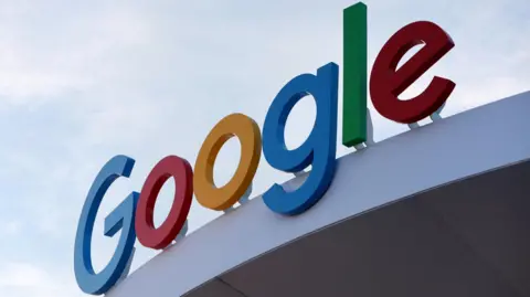Reuters Google's primary-colored logo outside of a building.