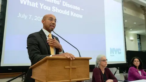 Getty Images At the town hall on the Upper East Side church this week, New York City Health Commissioner Alister Martin speaks