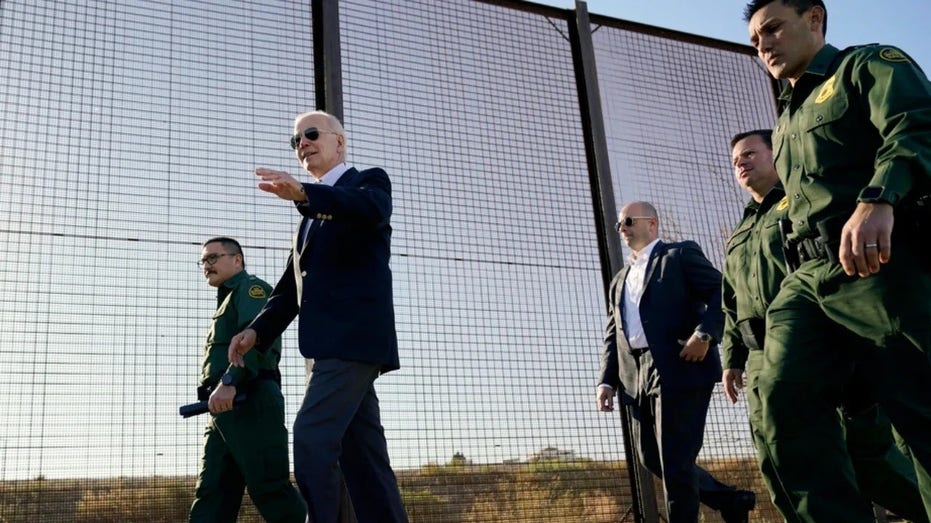 President Joe Biden walks along a stretch of the U.S.-Mexico border in El Paso Texas, Jan. 8, 2023.