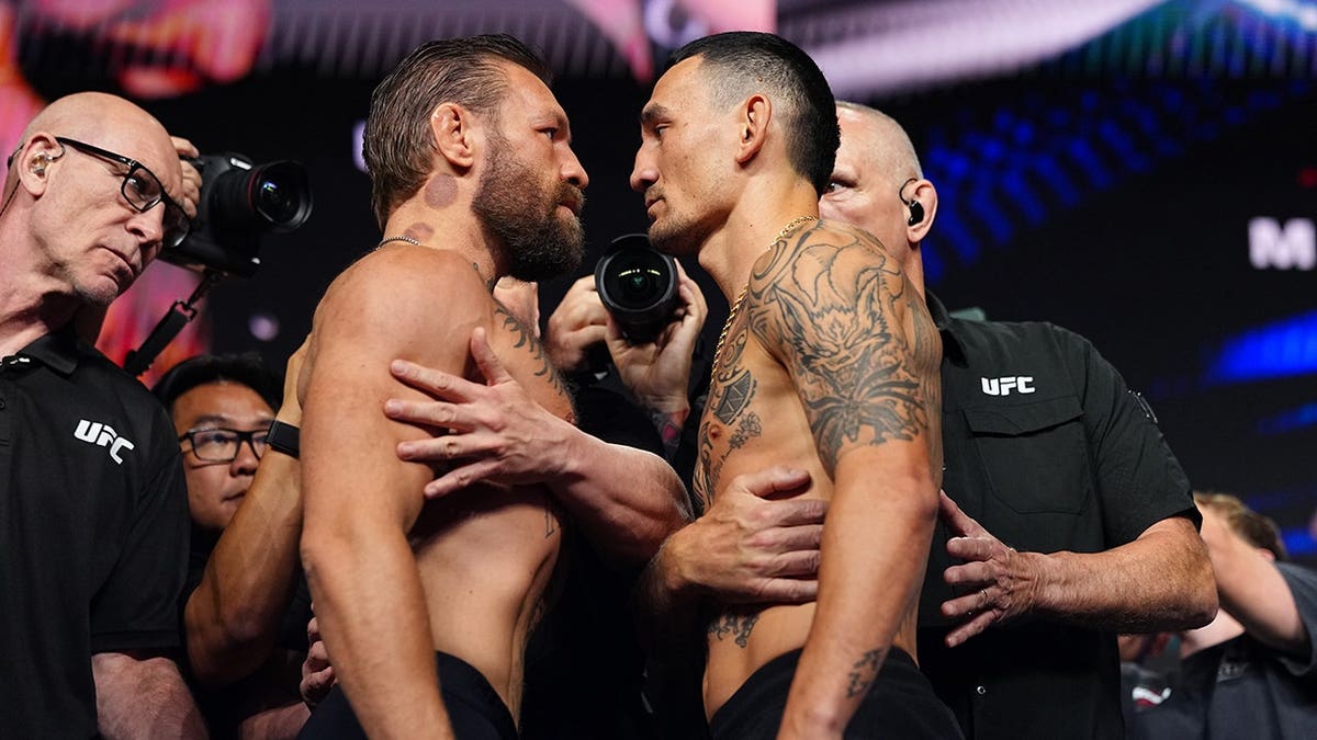 Conor McGregor and Max Holloway face off during the UFC 329 ceremonial weigh-in at T-Mobile Arena in Las Vegas, Nevada, on July 10, 2026.