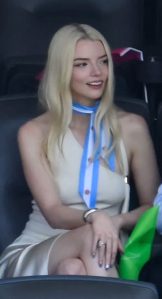 British-US actress Anya Taylor-Joy (C) and husband, US musician Malcolm McRae (R) are pictured prior to the 2026 World Cup football tournament final match between Spain and Argentina at the New York/New Jersey Stadium in East Rutherford on July 19, 2026.  (Photo by ANGELA WEISS / AFP via Getty Images)