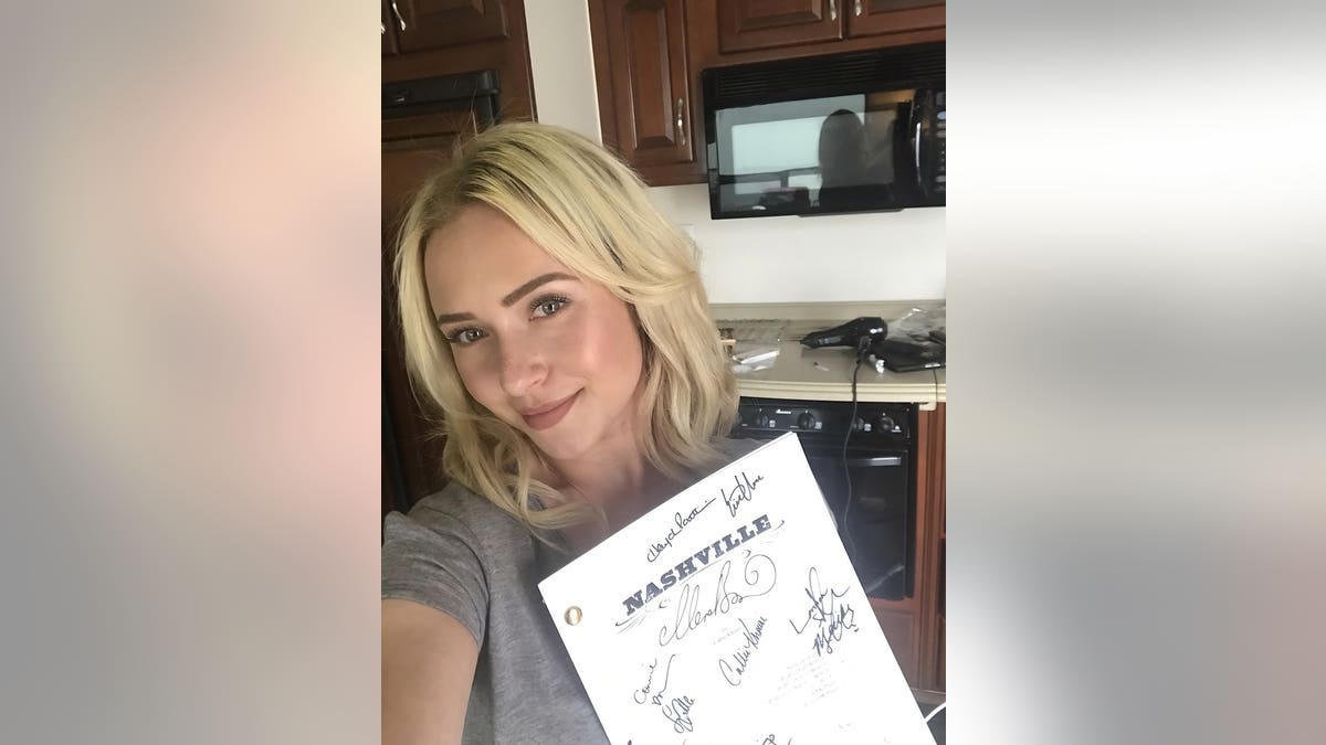 Hayden Panettiere holding a script for