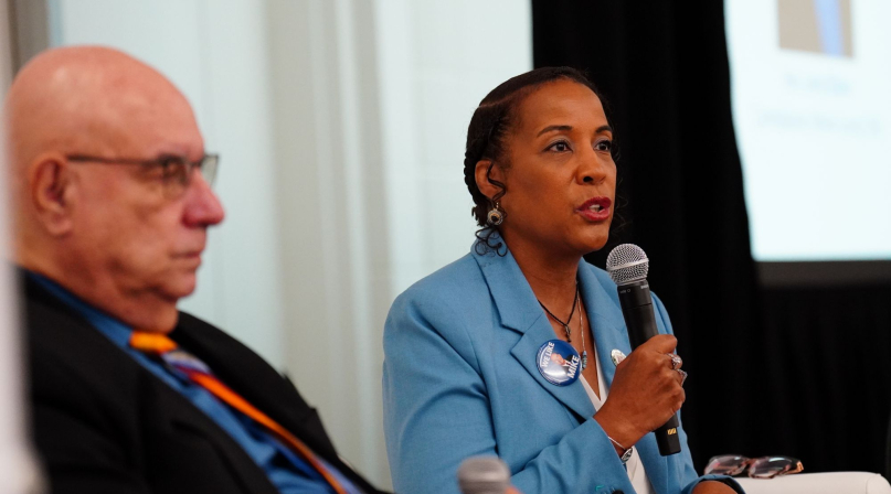 Athens County, Ohio Commissioner Lenny Eliason and Loudoun County, Va. Chair Phyllis J. Randall discuss the Good Governance Is Good Health toolkit Saturday. Photo by Leon Lawrence III