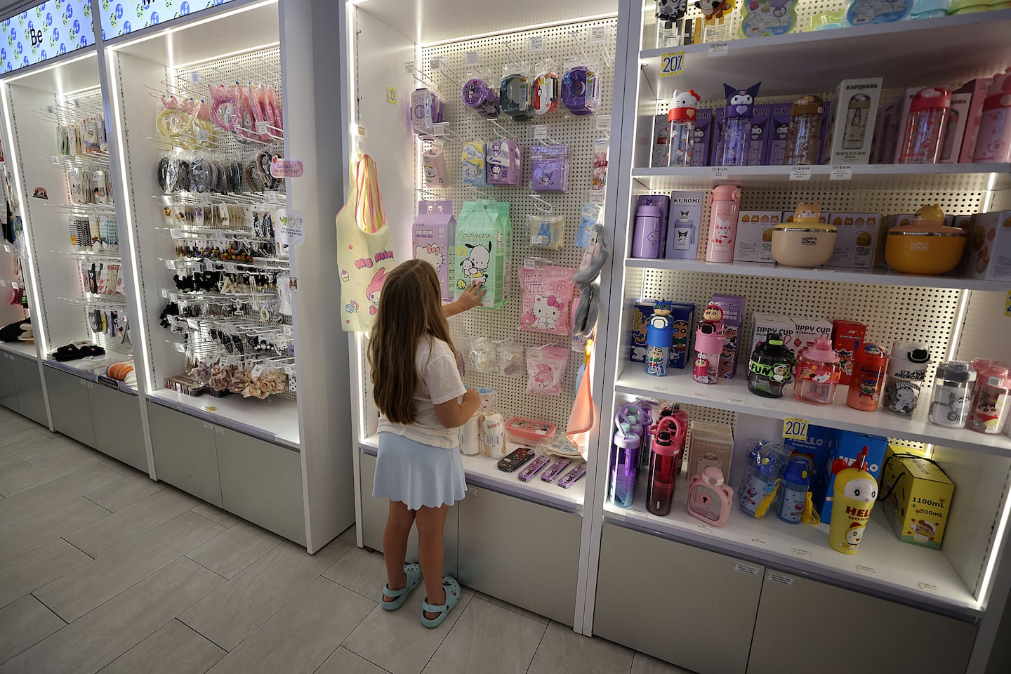 Avery Procopio, 7, shopped for toys at MoreFun.