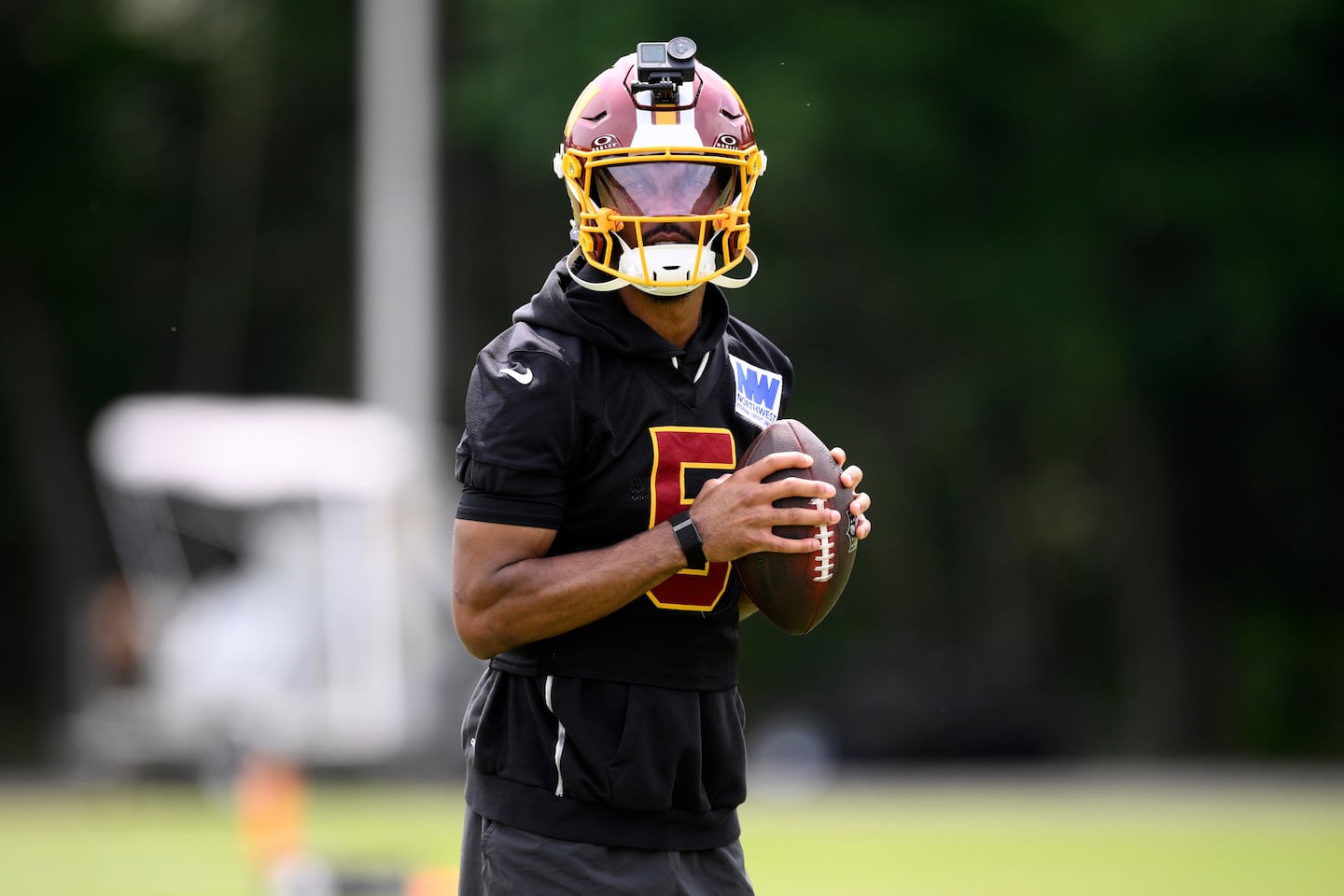 Washington Commanders quarterback Jayden Daniels at a June 9 practice in Ashburn, Va.