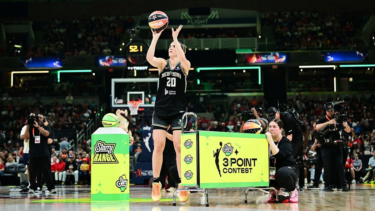 Sabrina Ionescu shooting the ball during the WNBA 3-point contest