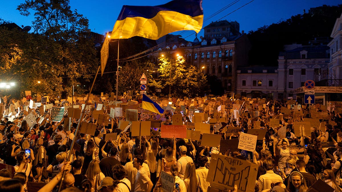 People protest against Ukrainian President Volodymyr Zelenskiy's decision to replace Mykhailo Fedorov as defense minister