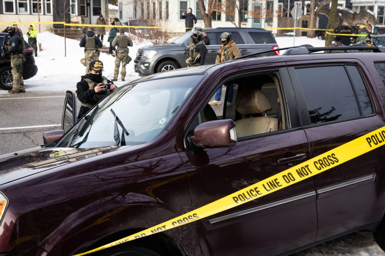A bullet hole and blood stains are seen in a crashed vehicle on at the scene of Renee Good's shooting in Minneapolis on January 7.