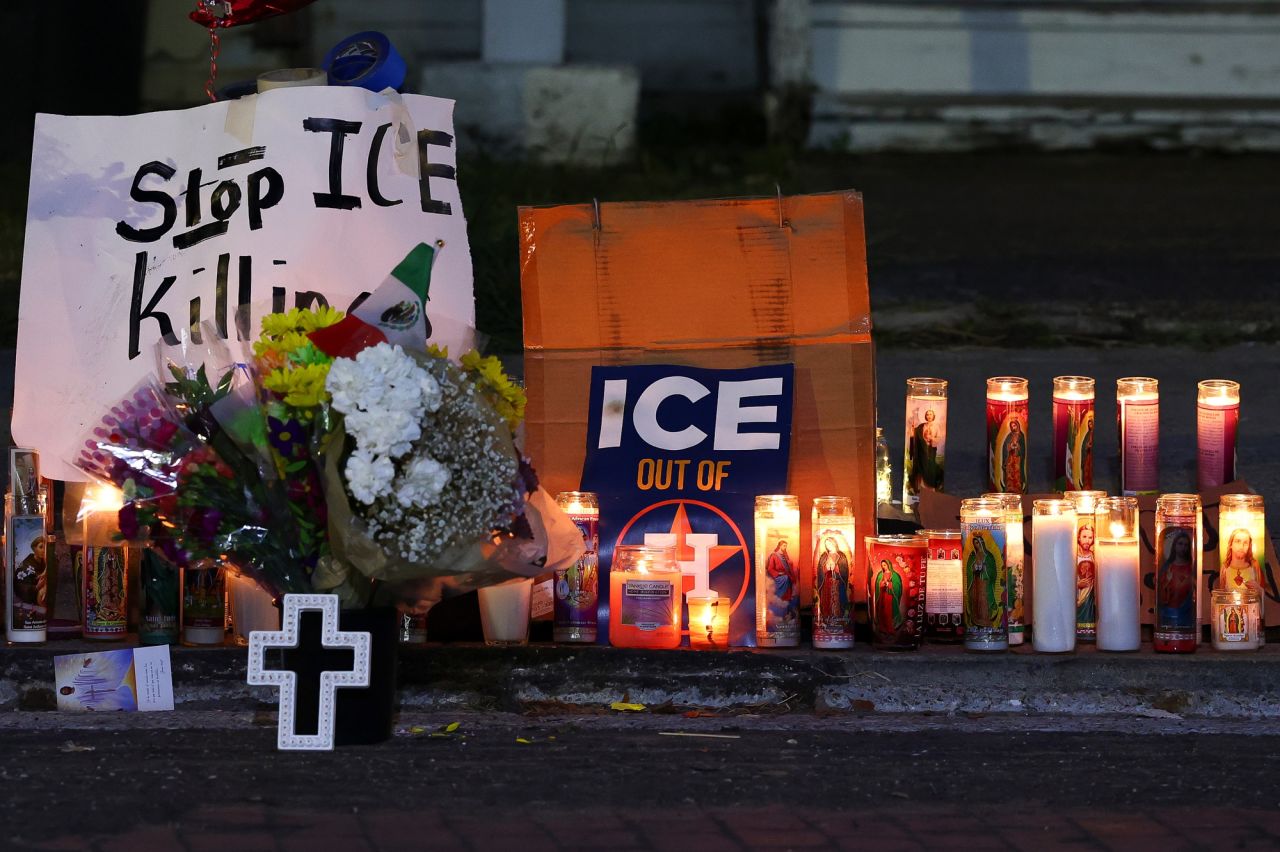 Flowers, candles and handwritten messages at a memorial site where Mexican immigrant Lorenzo Salgado Araujo was fatally shot by an Immigration and Customs Enforcement officer in Houston, on Saturday.