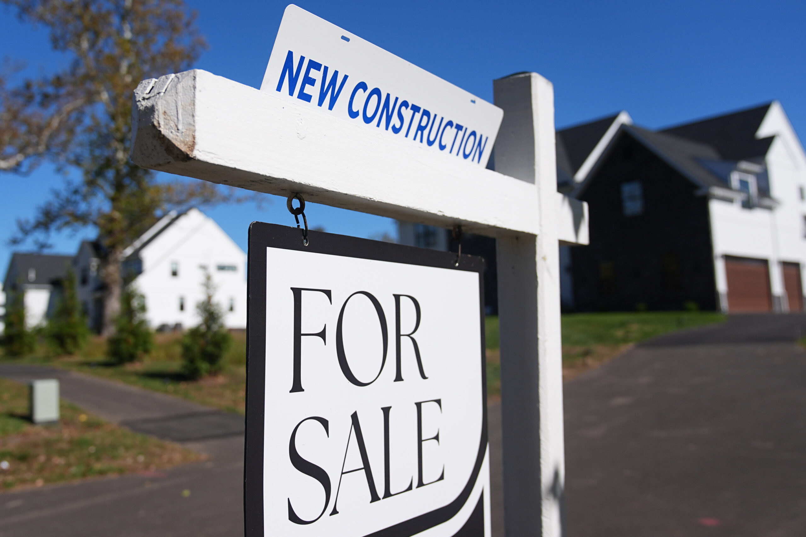 FILE - A sign is posted for a new home for sale in Ambler, Pa., Oct. 16, 2025.