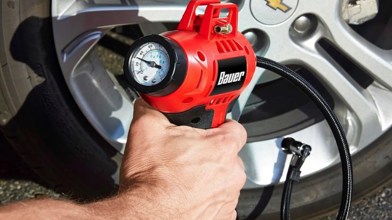 inflating a tire with Bauer inflator
