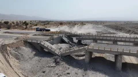 Getty Images Images shared on Friday showed a damaged bridge in Iran's southern Hormozgan province.