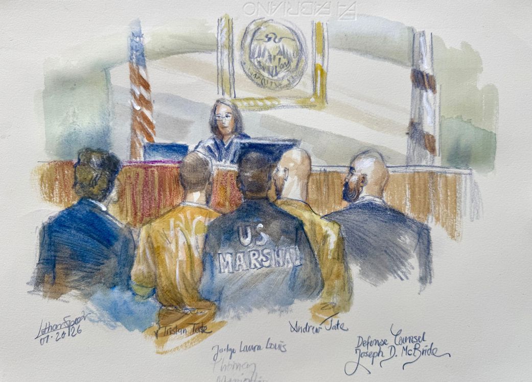 In this courtroom sketch, Andrew and Tristan Tate appear with their attorneys before judge Lauren Louis in Miami federal court on Monday in Miami.