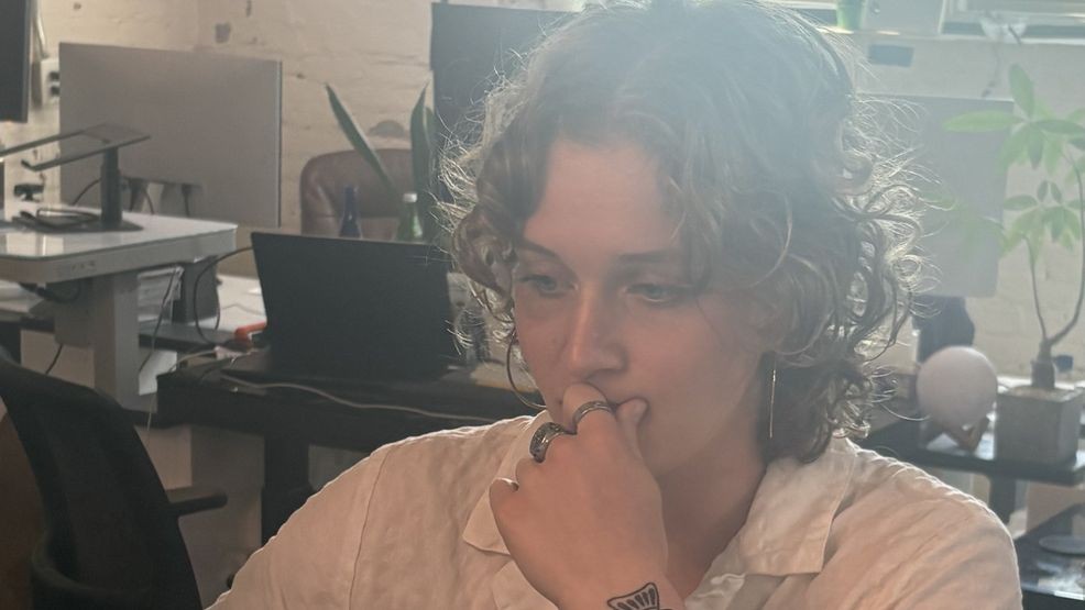 Hannah Johnston, a 2026 WMU graduate, is a graphic designer at Kzoom, a Kalamazoo based marketing company.