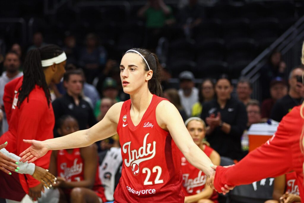 Caitlin Clark erupts for 32 points as Fever hold off Storm to complete season