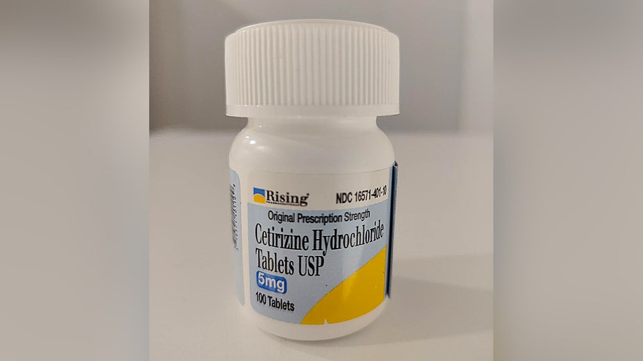 white bottle displaying Cetirizine Hydrochloride