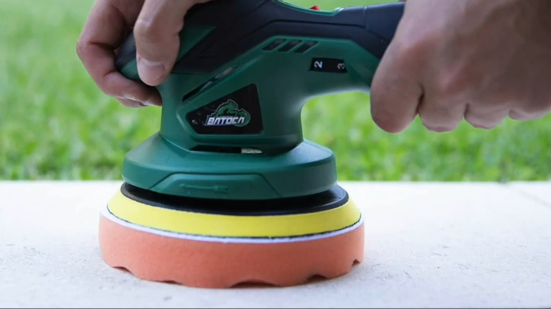 Person using the S3 Buffer on a ground surface
