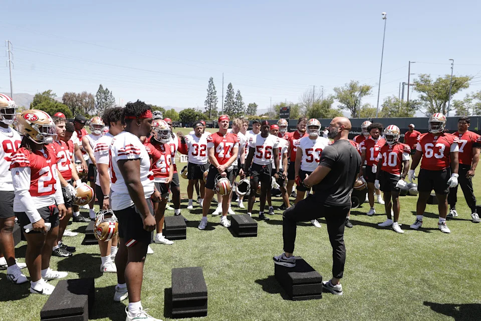 SANTA CLARA, CA - MAY 9: Vice President of Player Health and Performance Dustin Perry of the <a class="link " href="https://sports.yahoo.com/nfl/teams/san-francisco/" data-i13n="sec:content-canvas;subsec:anchor_text;elm:context_link" data-ylk="slk:San Francisco 49ers;sec:content-canvas;subsec:anchor_text;elm:context_link;itc:0" data-yga="{"yLinkElement":"context_link","yModuleName":"content-canvas","yLinkText":"San Francisco 49ers","ySubModuleName":"anchor_text","yHasCommerce":false}">San Francisco 49ers</a> talks to the rookies during Rookie Minicamp at SAP Performance Facility on May 9, 2025 in Santa Clara, California. (Photo by Michael Zagaris/San Francisco 49ers/Getty Images) | Getty Images