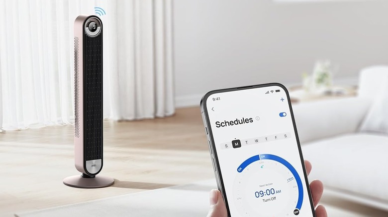 A person using the Dreo app to create a schedule for the Dreo 519S smart tower fan.