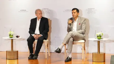 The Lodha Group Indian-American physicist Jainendra Jain and real estate tycoon Abhishek Lodha pictured at the launch of Lodha Theoretical Physics Institute in Mumbai in May 2026.