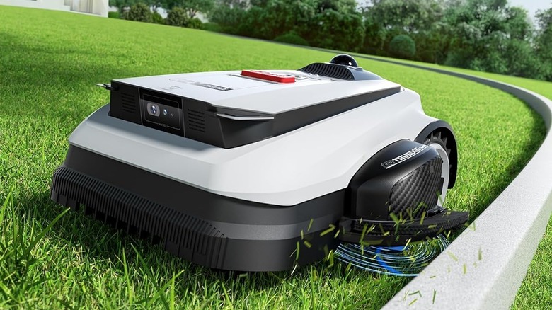The Ecovacs Goat A3000 LiDAR Pro robotic lawn mower outdoors cutting grass.
