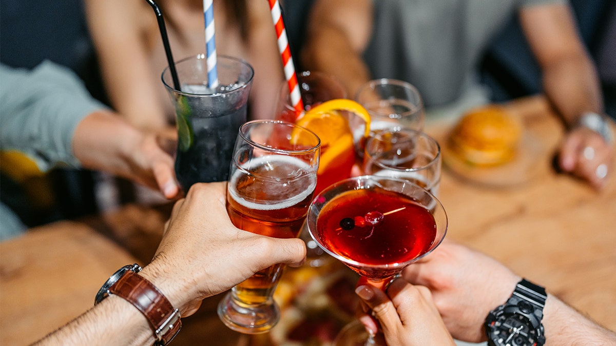 Group drinking alcohol