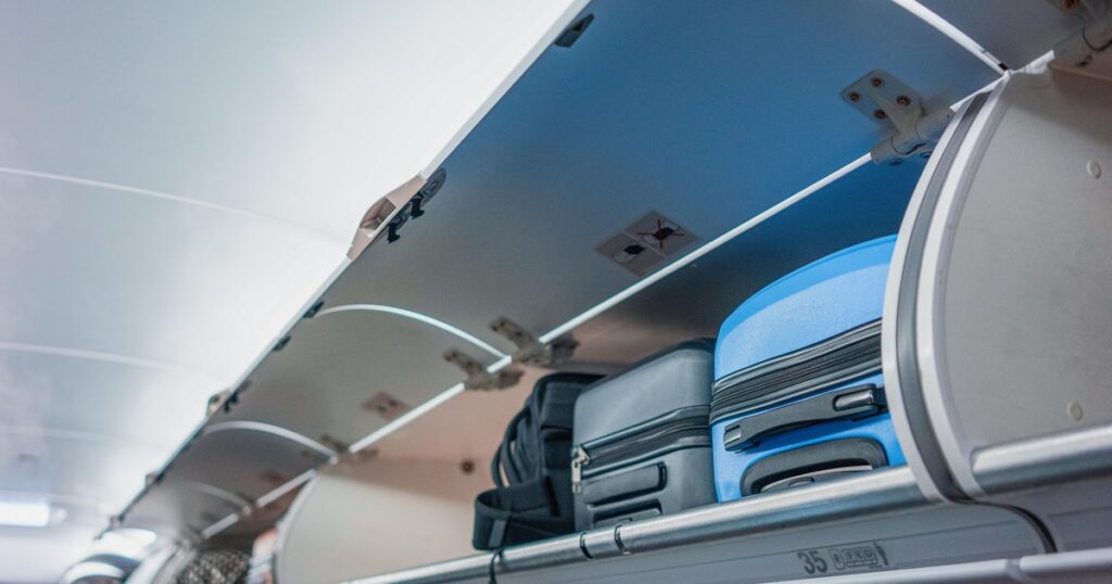 Why do airlines make passengers check their carry Why do airlines make passengers check their carry