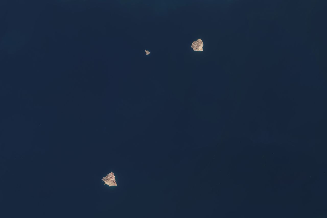 A satellite photo from March 16 shows Abu Musa, Greater Tunb, and Lesser Tunb, three small islands in the Persian Gulf near the Strait of Hormuz.