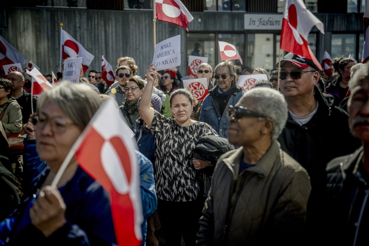 Protestors with Greenland flags take part in a demonstration against the US consulate's inauguration in Nuuk, Greenland, on May 21.