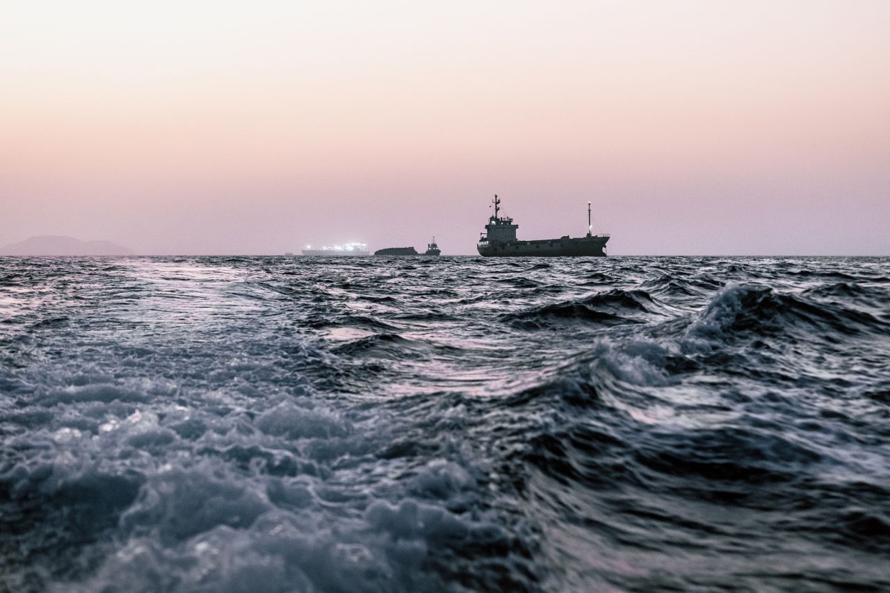 Oil tankers and cargo vessels remain anchored off Port Sultan Qaboos on June 21, 2026 in Muscat, Oman.