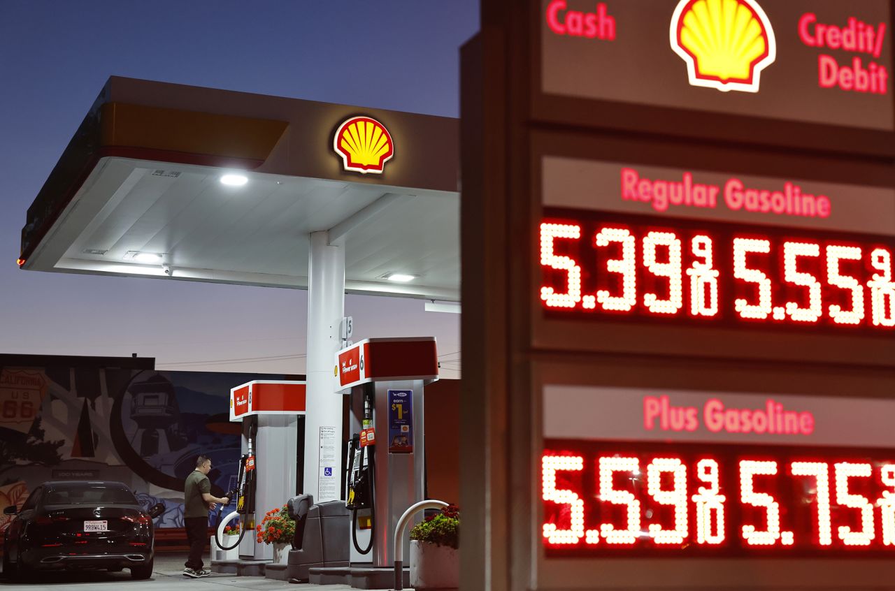 A customer at a gas station in Pasadena, California, on Tuesday.