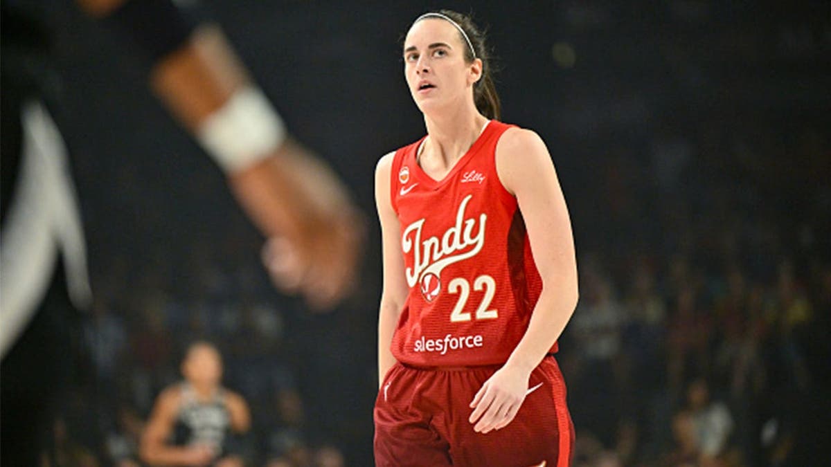 Caitlin Clark looks on from the court during the Indiana Fever's game against the Las Vegas Aces in Las Vegas.